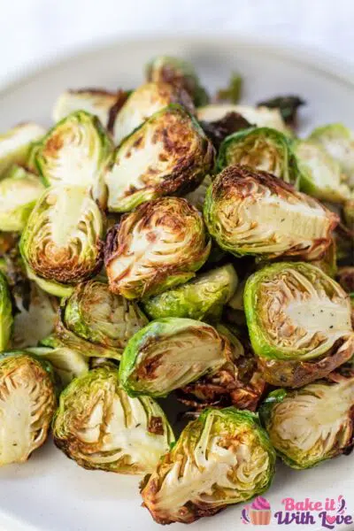 Closeup tall image of the air fryer brussel sprouts.