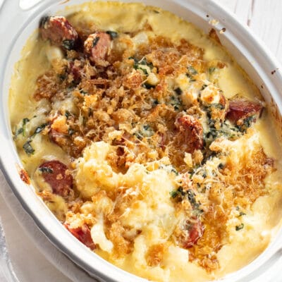 Baked cauliflower mac and cheese in casserole dish.