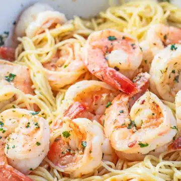 Tasty lemon garlic shrimp pasta in the skillet and ready to serve as a family favorite 20 minute dinner.