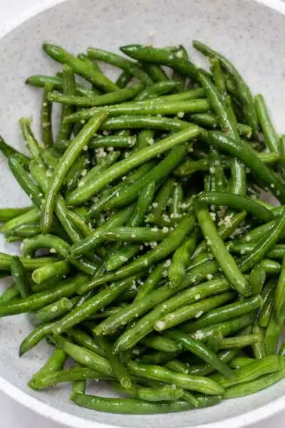 Process photo 1 tossing the green beans.