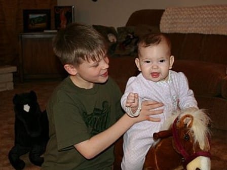 Lauren and Logan 2008 family photo taken at Grandma Sue's house in Silverton, Oregon.