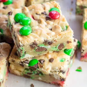 Closeup on the sliced and stacked Christmas MM cookie bars.