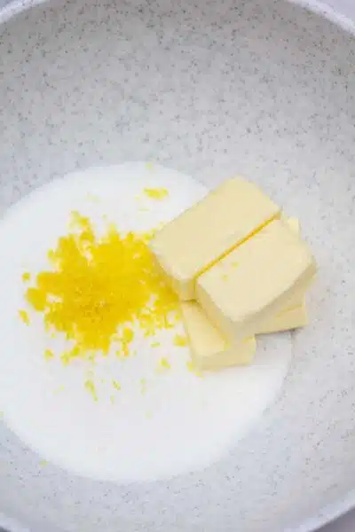 Process photo 1 add butter, sugar, and lemon zest.