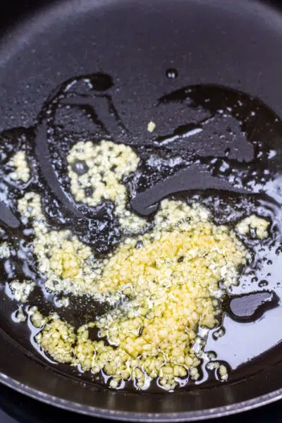 Process photo garlic sauteeing.