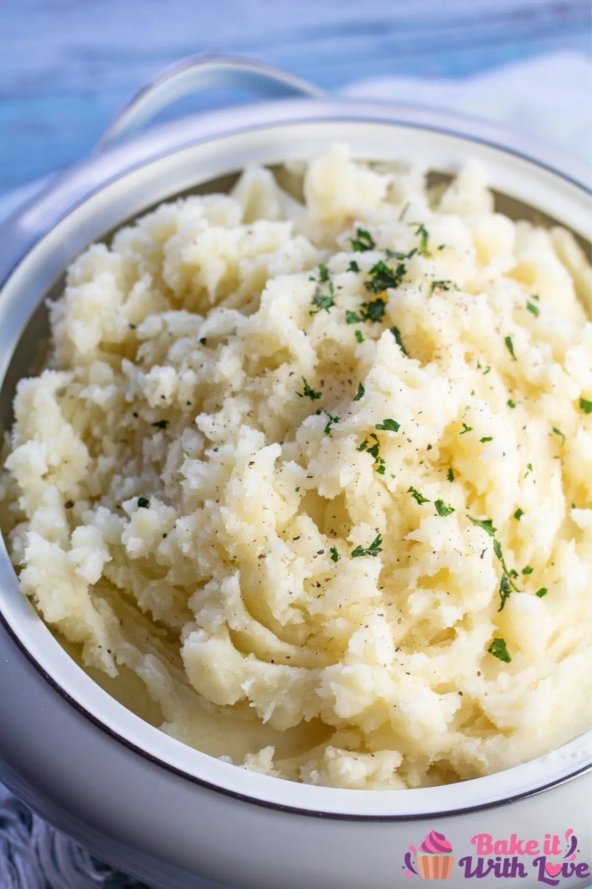 Fluffy mashed potatoes without milk in serving dish.