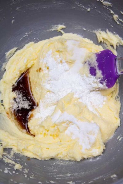 Process photo 3 add vanilla extract baking powder and baking soda.