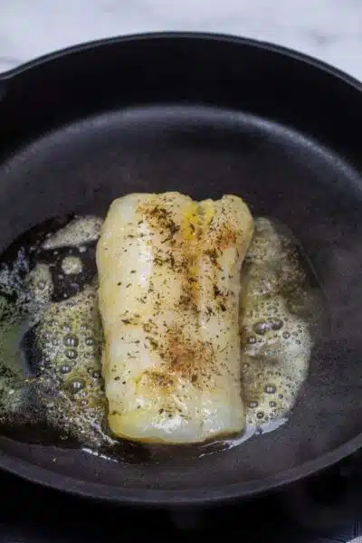 Process image 3 showing searing cod fillet in pan.