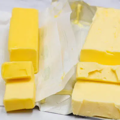 Side by side image of butter vs shortening comparing opened packages.