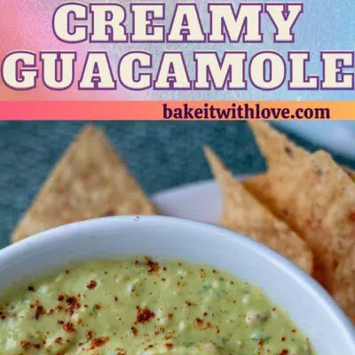 Pin for creamy guacamole showing guacamole in a white bowl surrounded by tortilla chips.