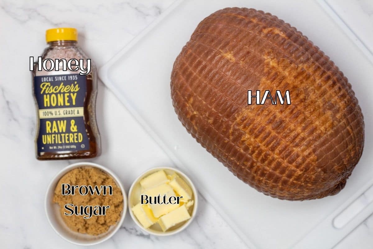 Ingredient photo showing ham, honey, butter, and brown sugar.