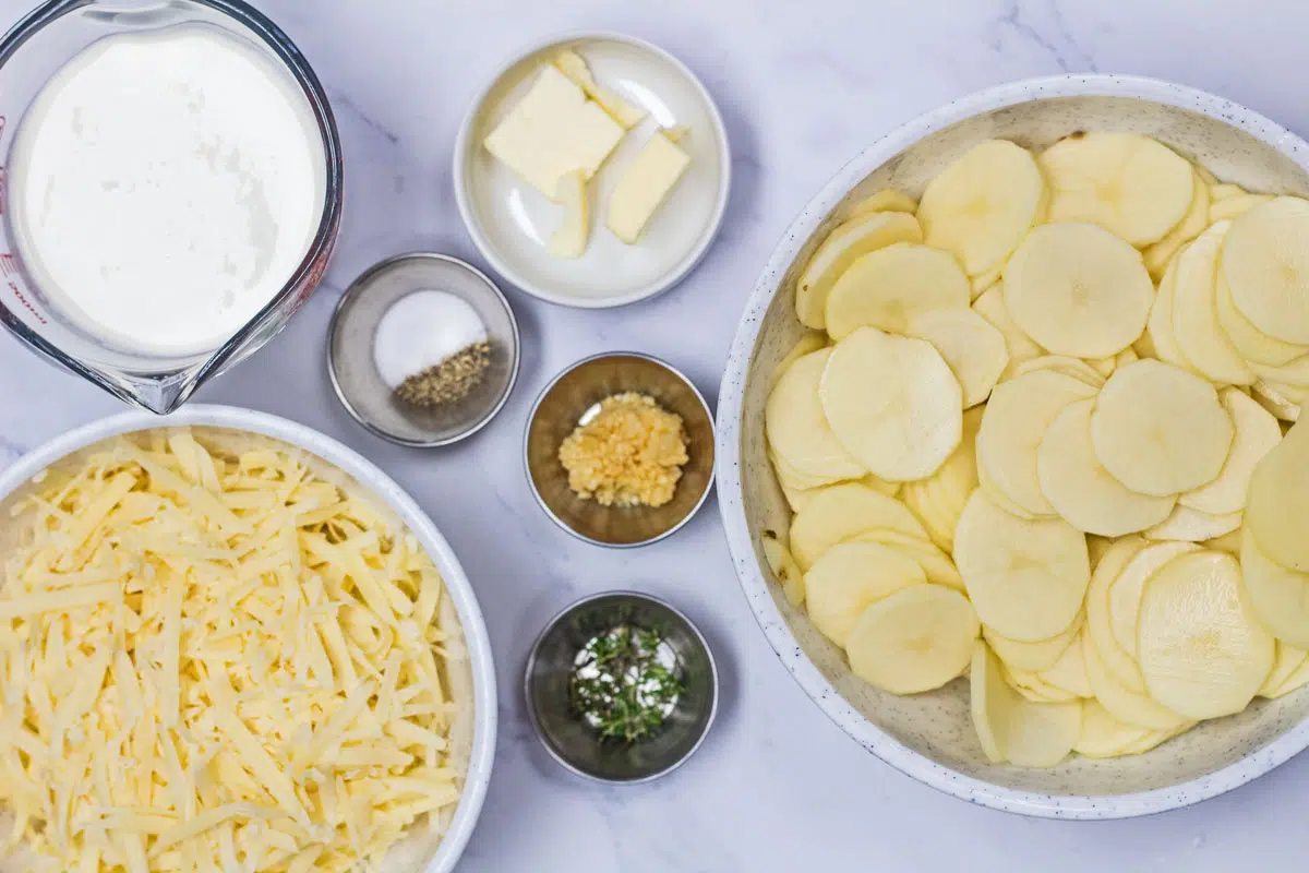 Dauphinoise potatoes ingredients needed before starting the recipe.
