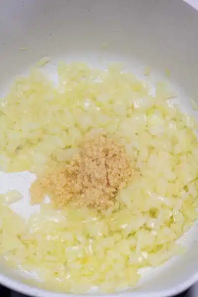 Process photo 1 saute onion and add minced garlic.