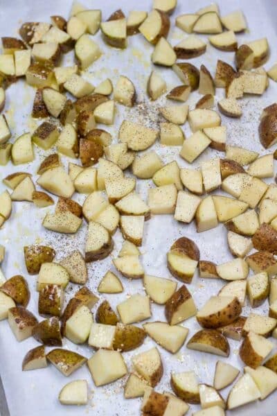 Process photo 2 showing diced potatoes seasoned.