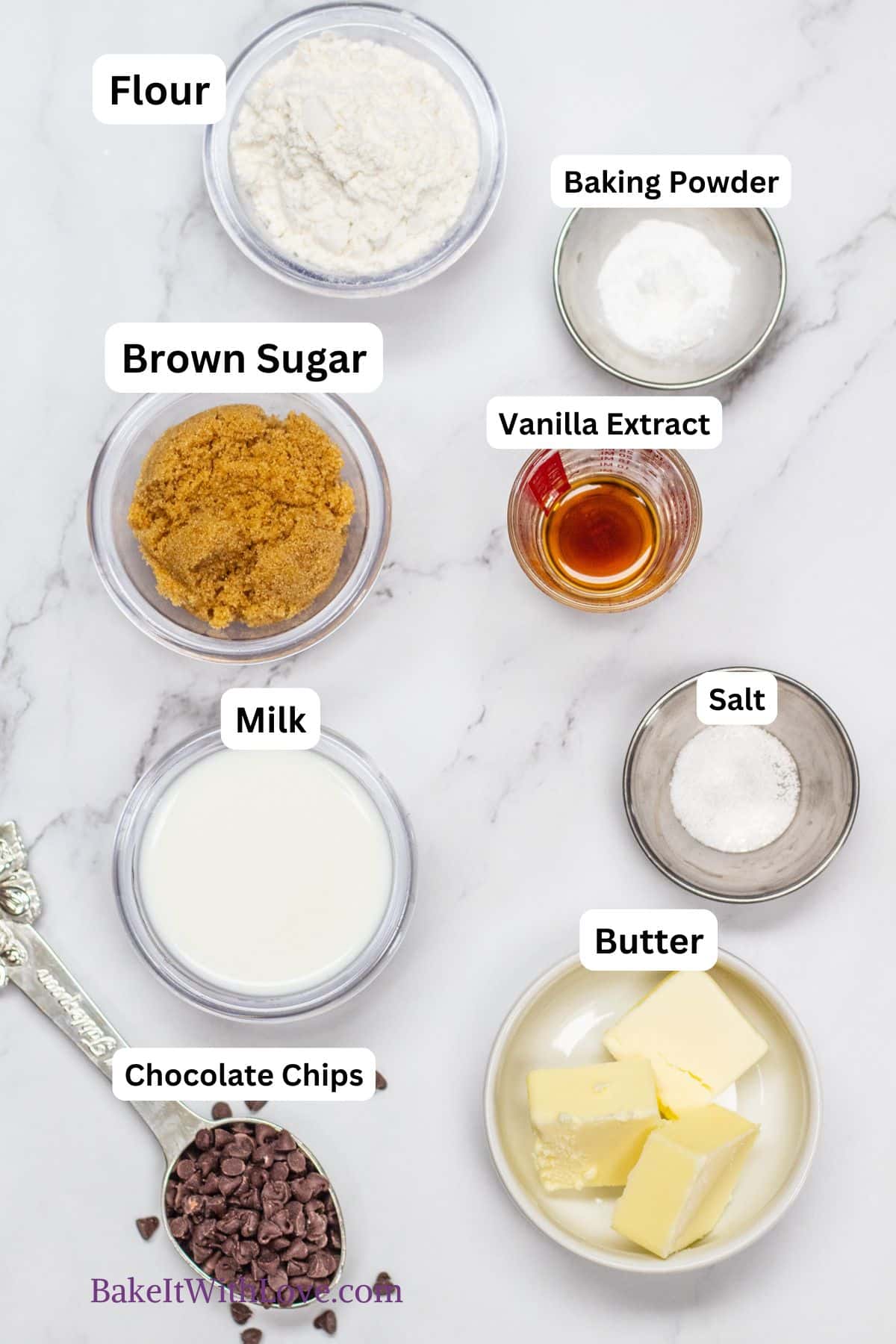 A tall image showing chocolate chip mug cake ingredients with labels.