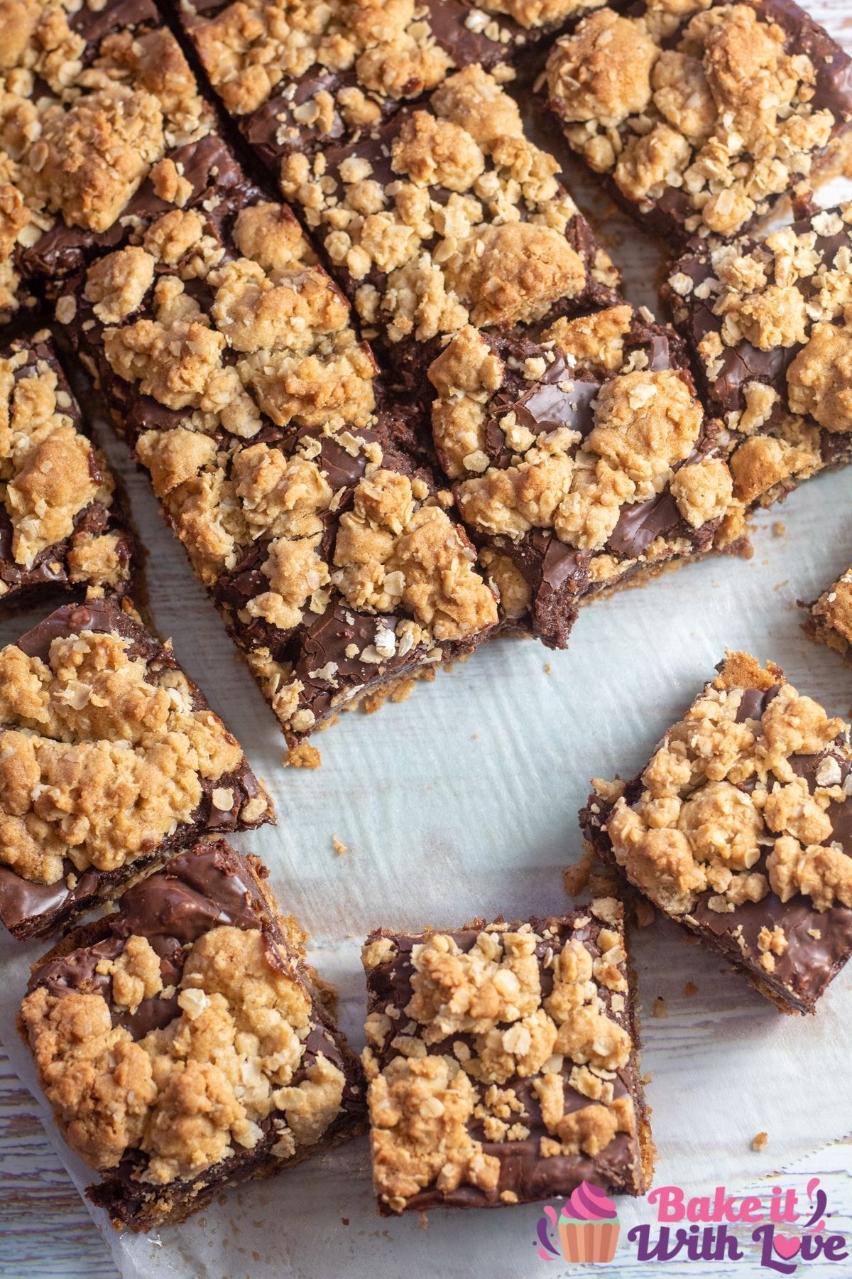 Tall overhead image of the chocolate revel bars with oatmeal crust and crumble topping.