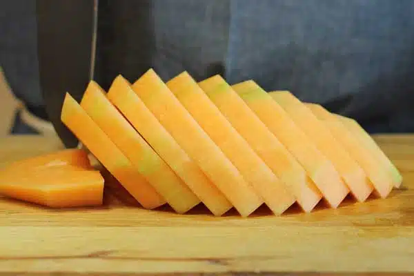 Cantaloupe cut into slices.
