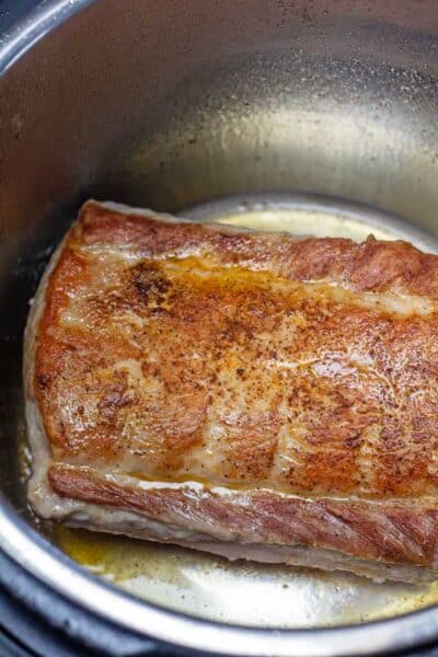 Process photo 1 showing seared pork loin.