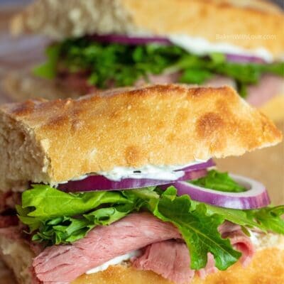 Pin image with text of prime rib sandwich.