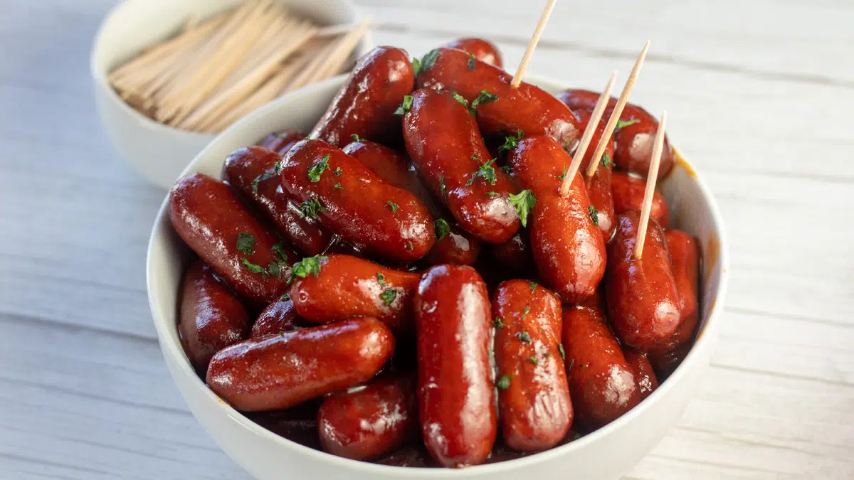 Wide angled overhead image of the 2 ingredient bbq little smokies with toothpicks.