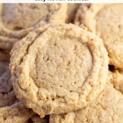 Pin image with text of multiple peanut butter cookies.