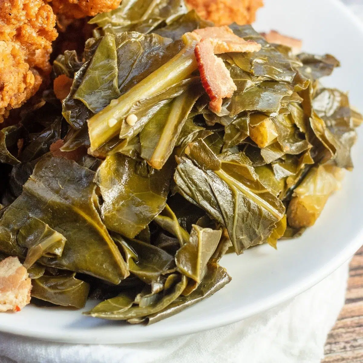 Best Instant Pot collard greens cooked in delicious broth and bacon.