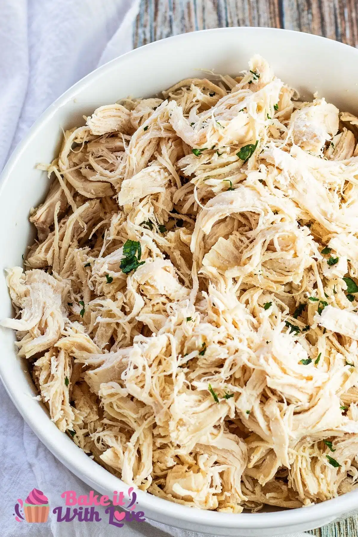 Tall overhead image of the best Instant Pot shredded chicken ready for making tasty dinners.