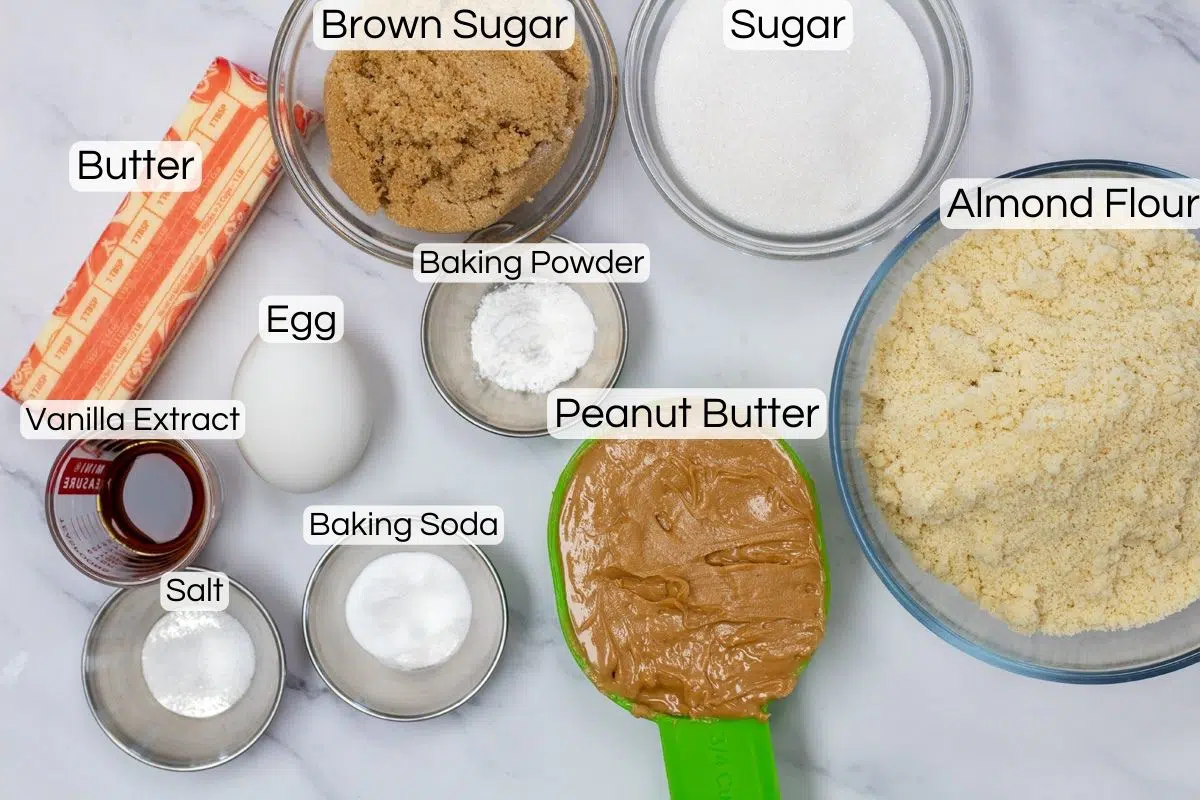 Wide photo showing ingredients needed to make almond flour peanut butter cookies.