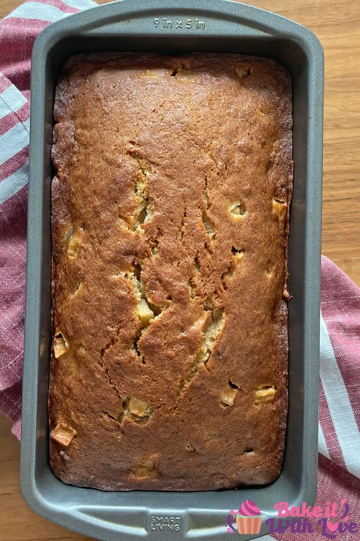 Overhead of the baked apple banana bread in loaf pan.
