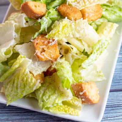 Best caesar salad dressing without anchovies or eggs served with freshly grated Parmesan cheese.