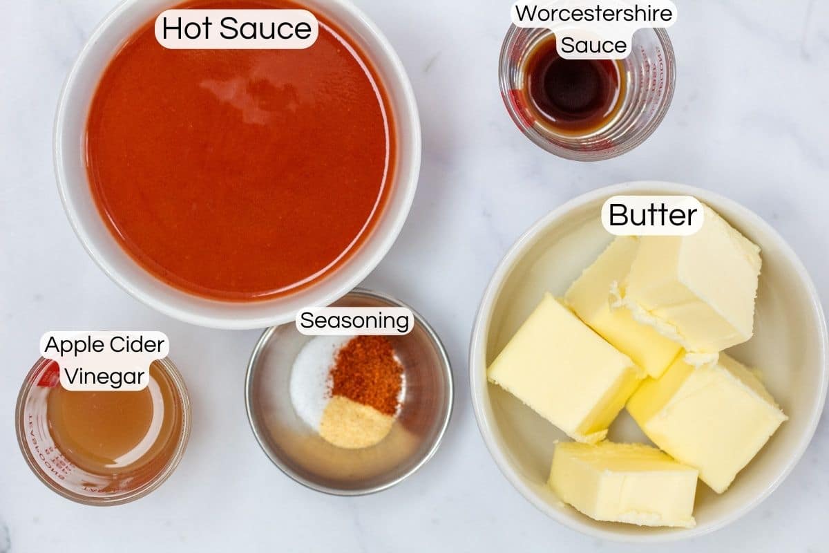 Wide photo showing ingredients needed for wing sauce.