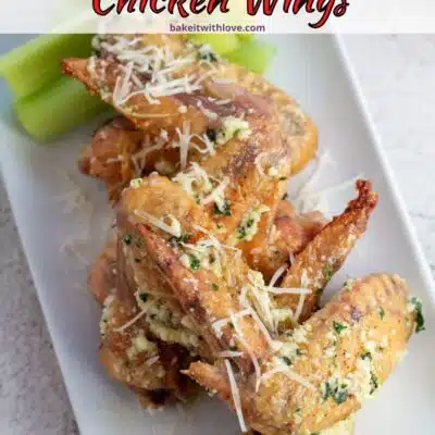 Best garlic parmesan chicken wings pin with text header.
