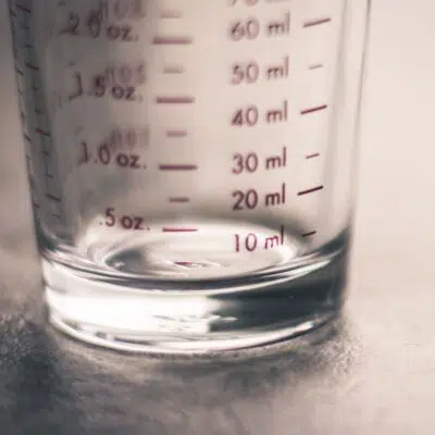 How many oz in a shot and ml conversions too with graduated measuring glass.