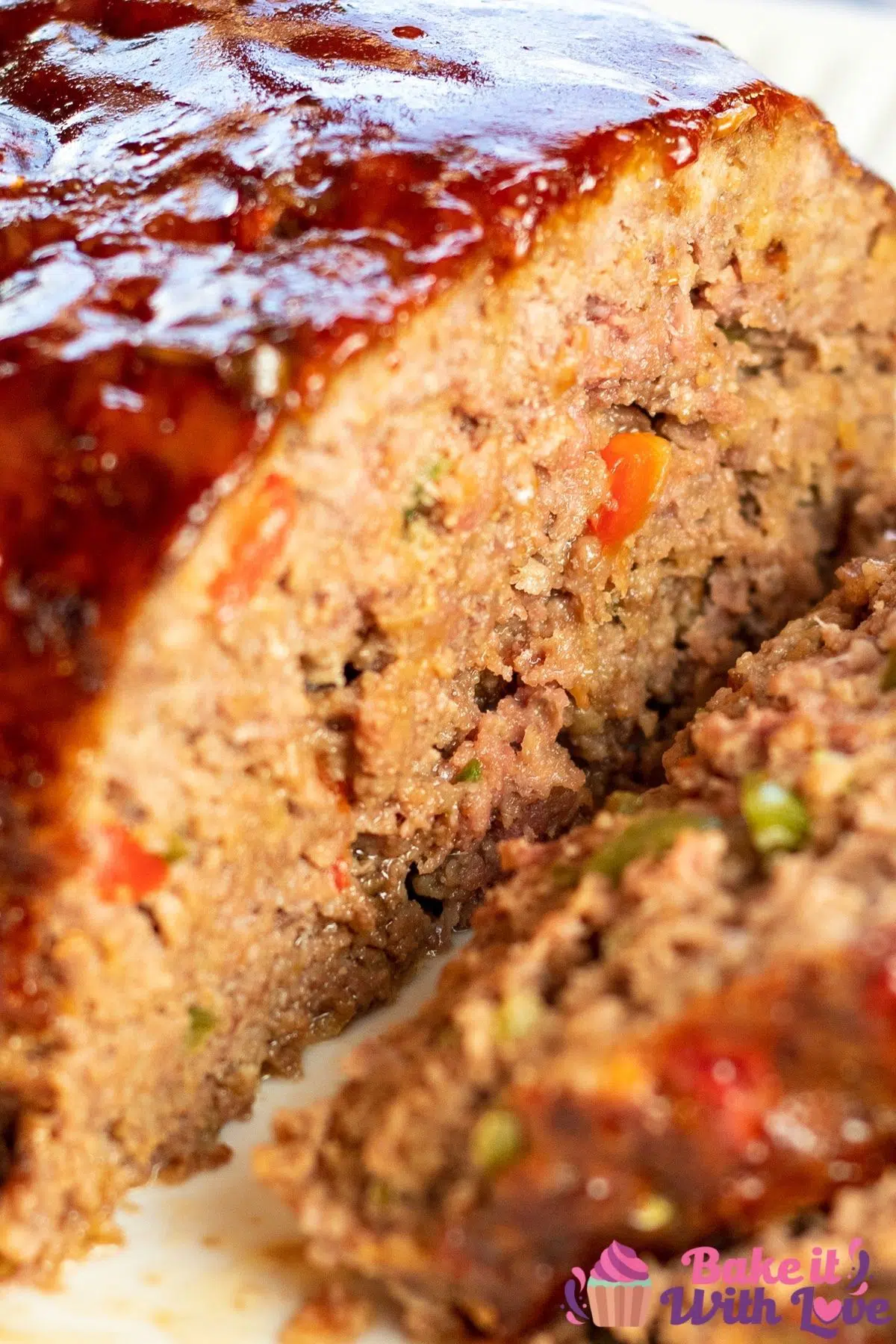 Tall closeup of the sliced sweet and sour meatloaf.