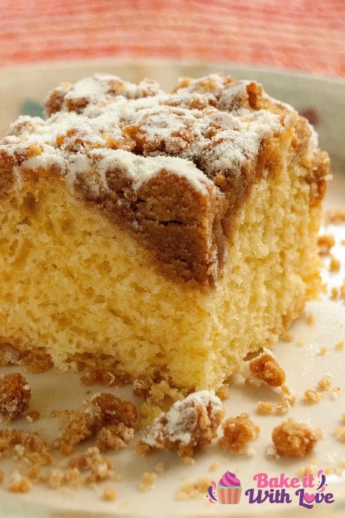 Tall closeup image of the sliced Bisquick coffee cake.