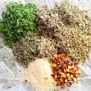 Square image of homemade Italian seasoning spices.
