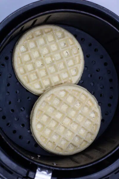 Process photo 1 place the frozen waffles in a single layer in the air fryer basket.