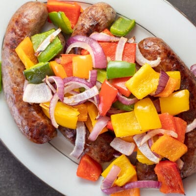 Best air fryer sausage and peppers and onions cooked to perfection and ready to serve.