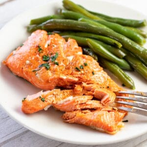 Best air fryer salmon served with simple green beans on the side.