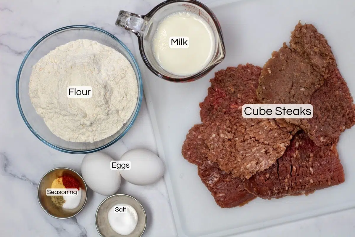 Overhead ingredient photo showing items needed to make chicken fried steak.