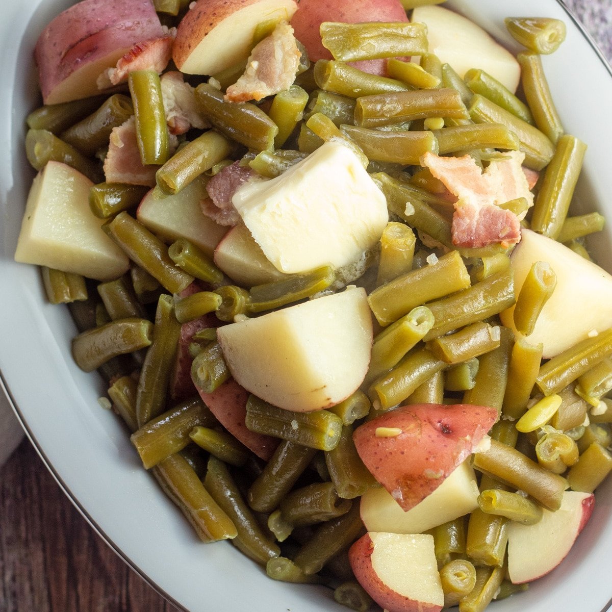 https://bakeitwithlove.com/wp-content/uploads/2022/03/crock-pot-green-beans-and-potatoes-sq1.jpg
