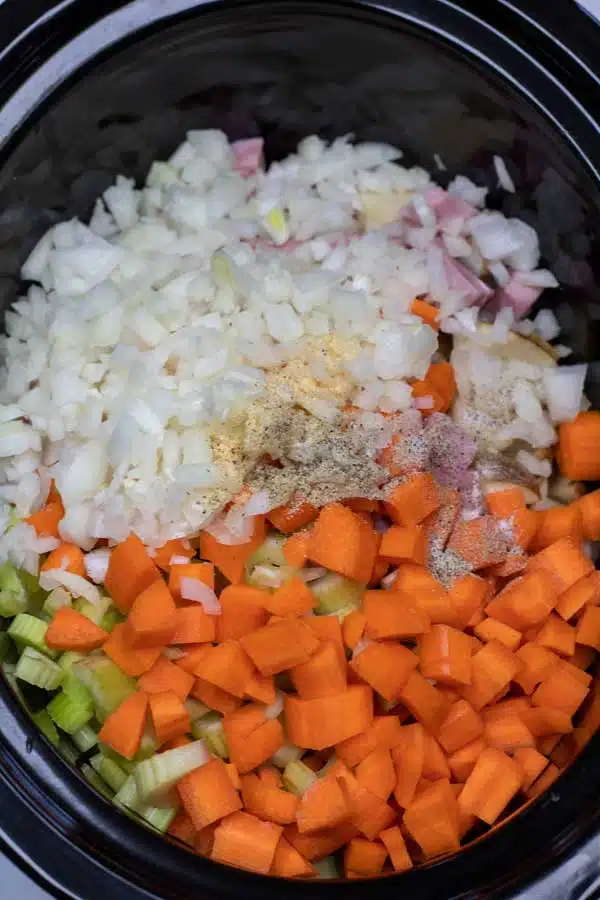 Process photo 2 add the sliced and diced onion, carrots, celery.