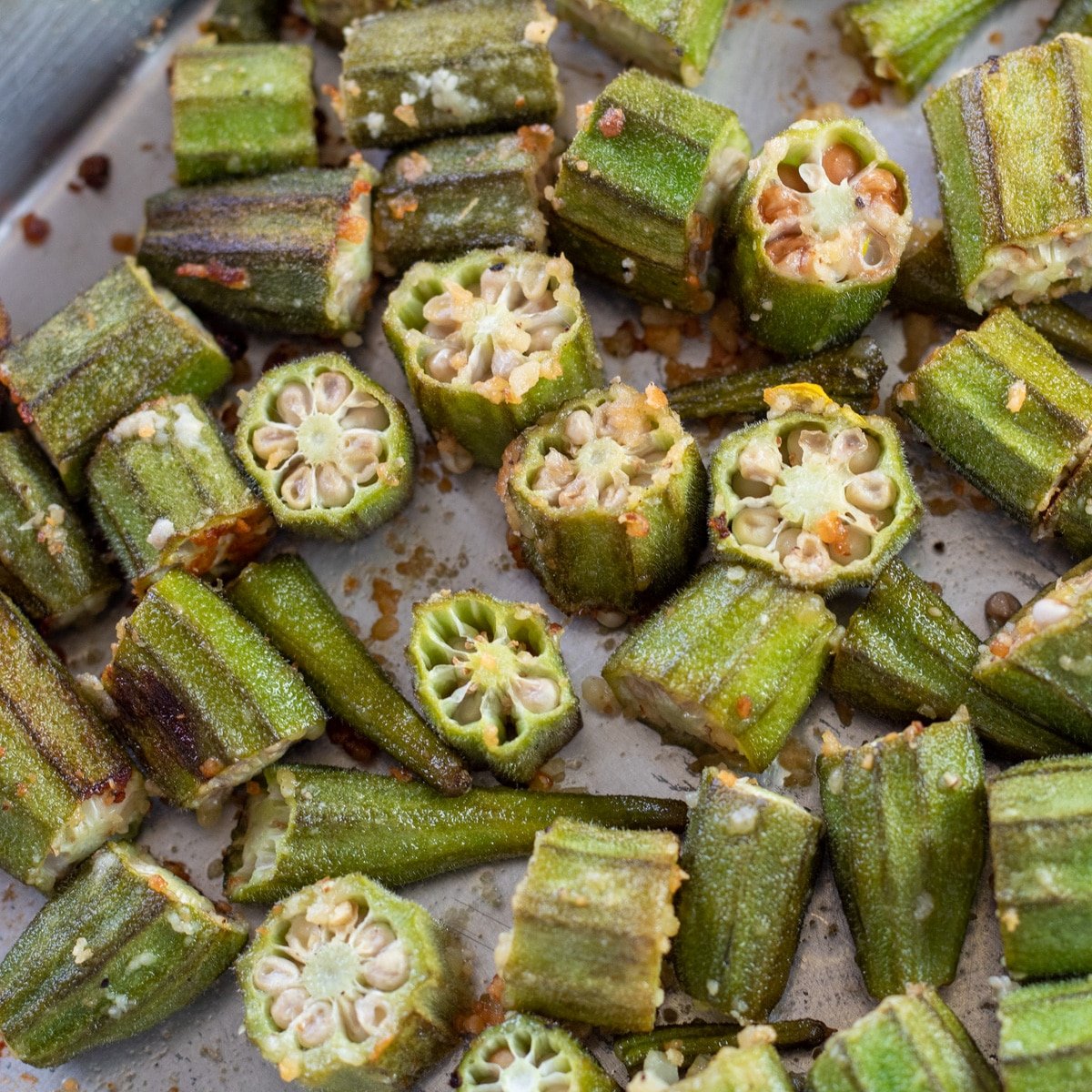The best roasted okra is easy to make and turns out tender when cut into bite size pieces like these.