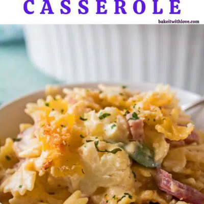 Pin image with text of cauliflower ham pasta in a white bowl.