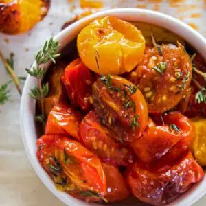 Flavorful cherry tomato recipes featuring simple roasted tomatoes with herbs.