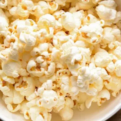 Easy stovetop popcorn pops up light and perfectly fluffy like this tasty bowl!
