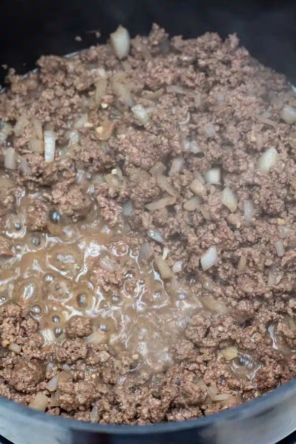 Process photo 4 showing browning ground beef.