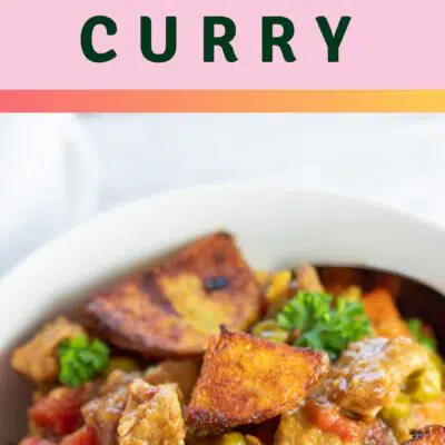 Pin image with text of leftover lamb curry in a white bowl.