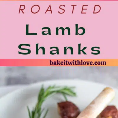 Pin image with text of roasted lamb shank on a white plate with roasted potatoes.