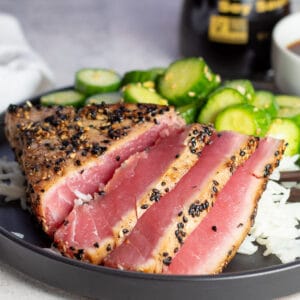 Pan seared ahi tuna steaks after brushing with sesame and crusting with sesame seeds.