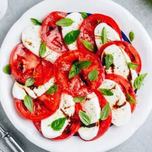 Best caprese salad served while the tomatoes, mozzarella, and basil are fresh and vibrant.